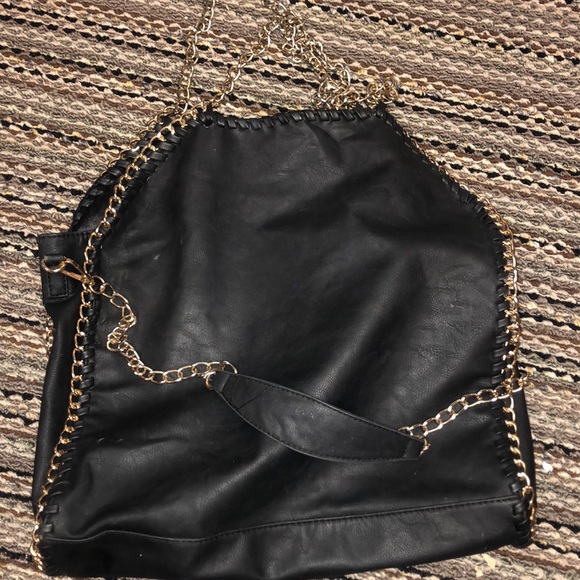 Black stylish bag with gold accent - Picture 1 of 4